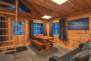 Feriendorf Harriniva - Blockhütte am Fluss