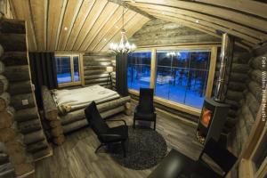 Hotel Muotka - Panorama Blockhütte mit Doppelbett