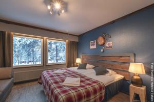 Hotel Jeris - Doppelzimmer mit winterlichem Ausblick